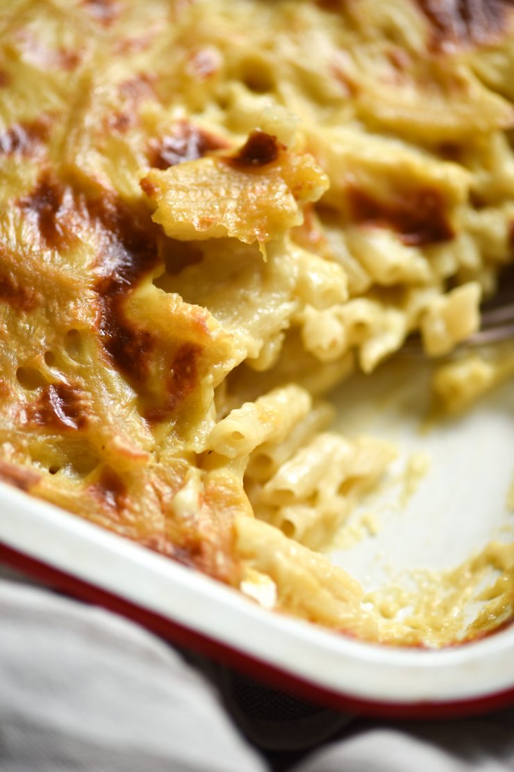 Vegan, gluten free mac and cheese in a white baking dish