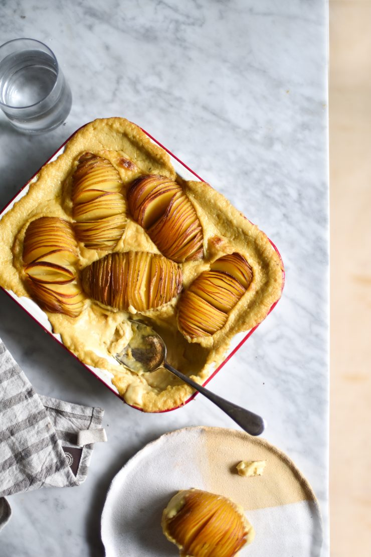 Gluten free, vegan, FODMAP friendly cheesy hasselback potato bake from www.georgeats.com