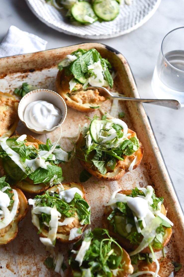 Vegan cheesy miso baked potatoes with fennel cucumber salsa from www.georgeats.com