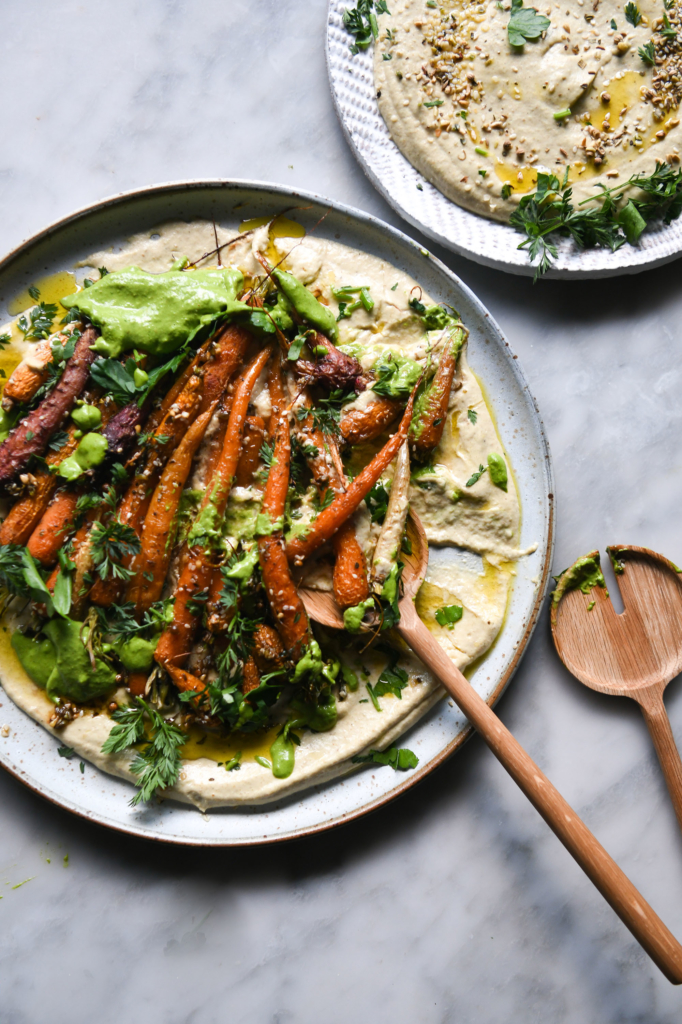 Dukkah and honey roasted carrot salad with FODMAP friendly hummus and a green herb sauce from www.georgeats.com
