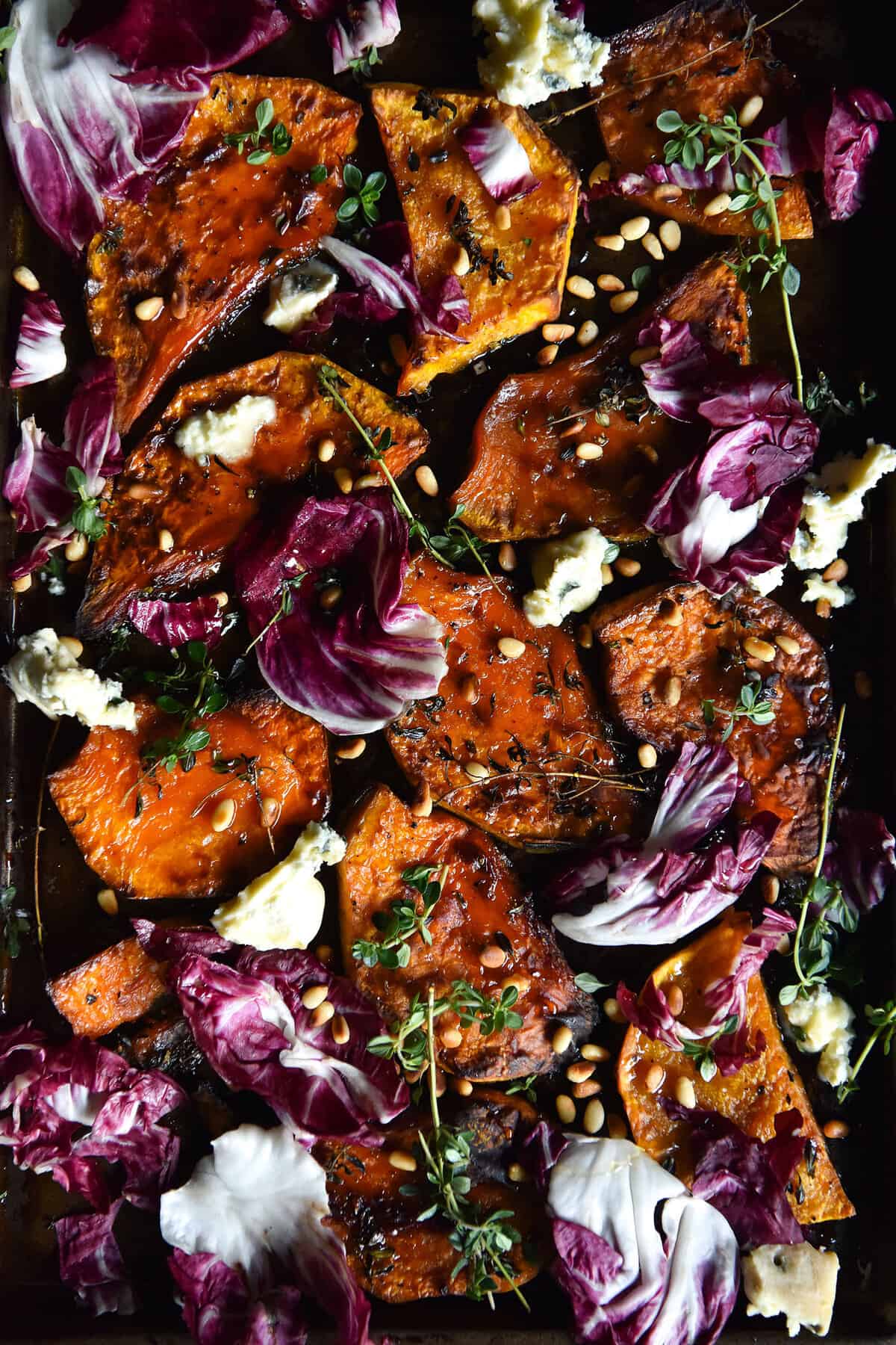 Honey and lemon thyme roasted pumpkin with blue cheese, radicchio and toasted pine nuts from www.georgeats.com. Gluten free, FODMAP friendly and vegetarian.