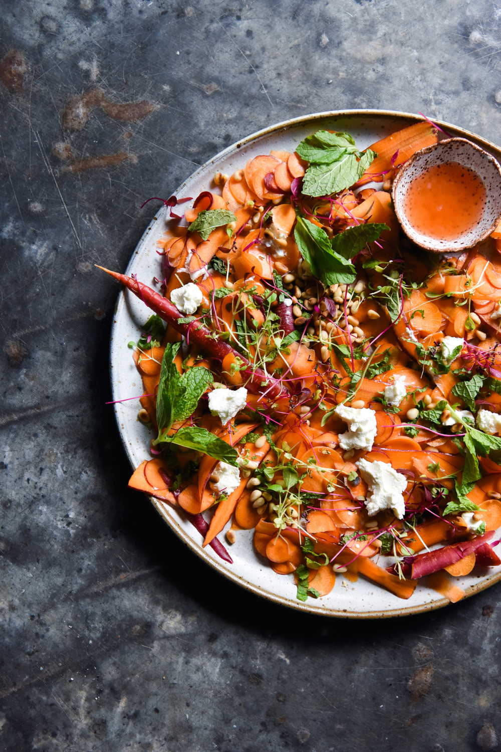 Shaved carrot, goat's cheese, toasted pine nut and mint salad with an ...