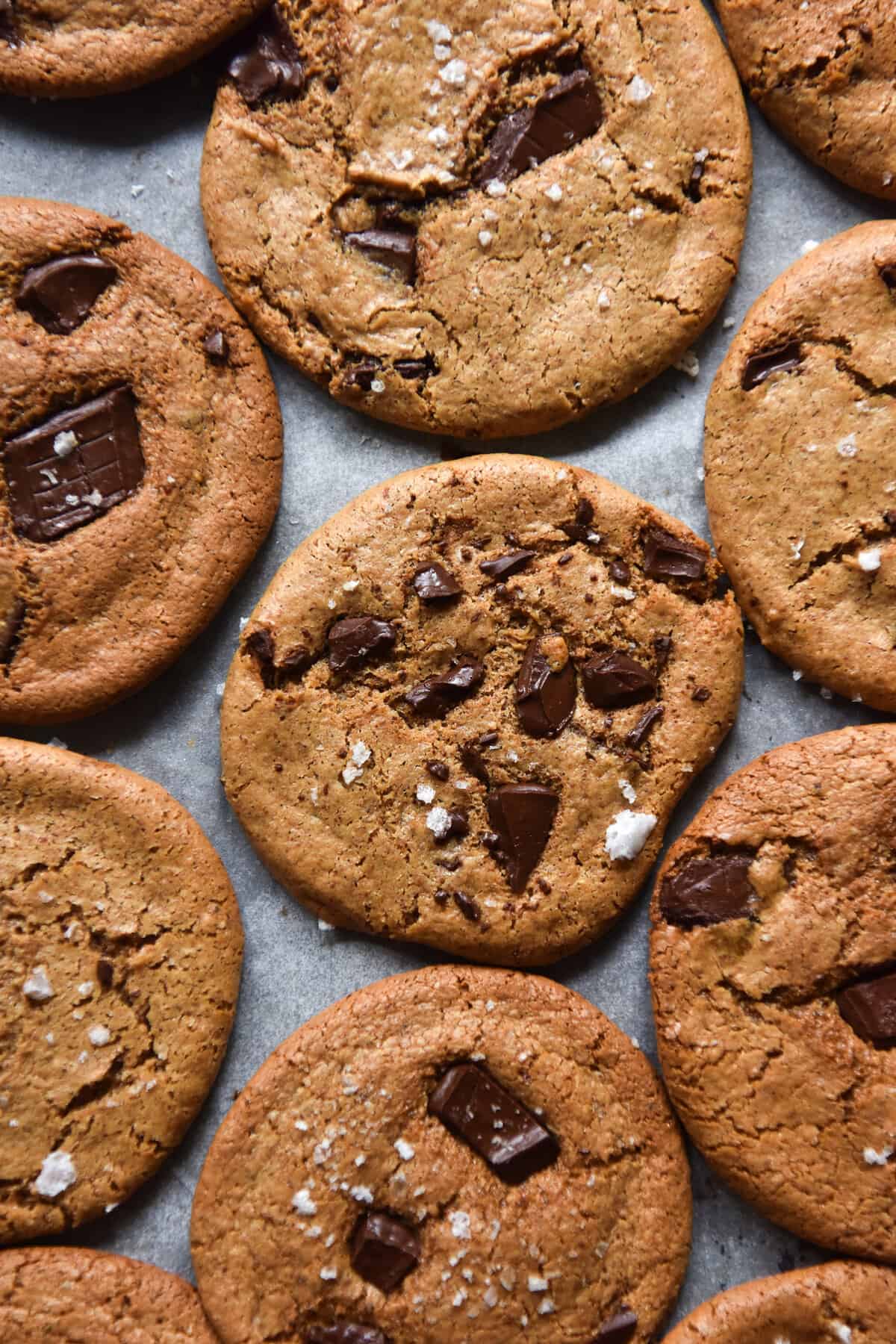 An aerial image of 3 ingredient almond butter cookies on a baking tray. 