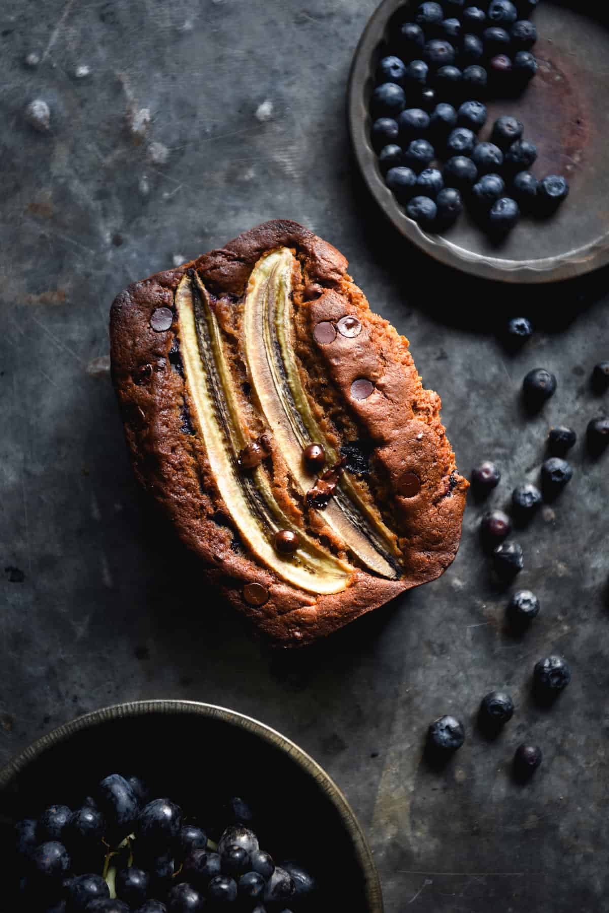 Gluten free, refined sugar free and nut free brown butter banana bread with blueberries and dark chocolate