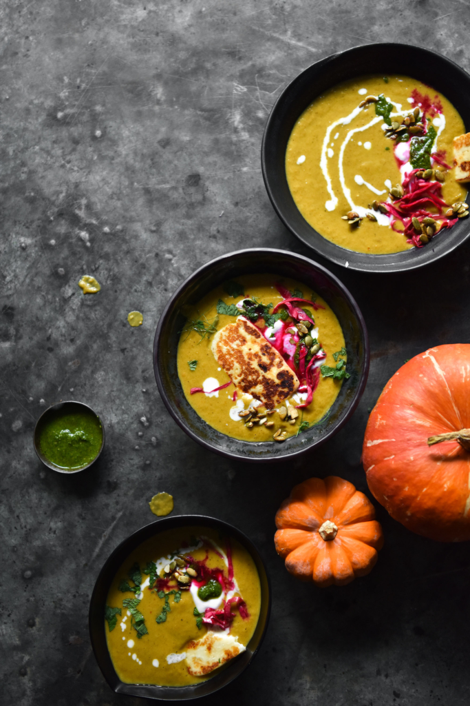 Moroccan spiced pumpkin soup with preserved lemon mint sauce, chilli honey pepitas and halloumi dippers from www.georgeats.com. Gluten free, vegetarian and FODMAP friendly.