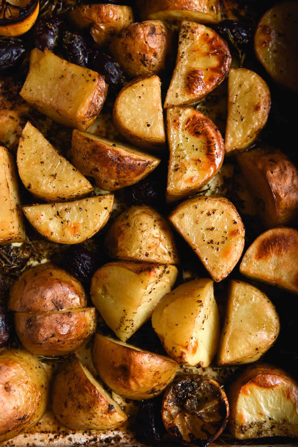 An aerial image of a tray of Greek lemon potatoes