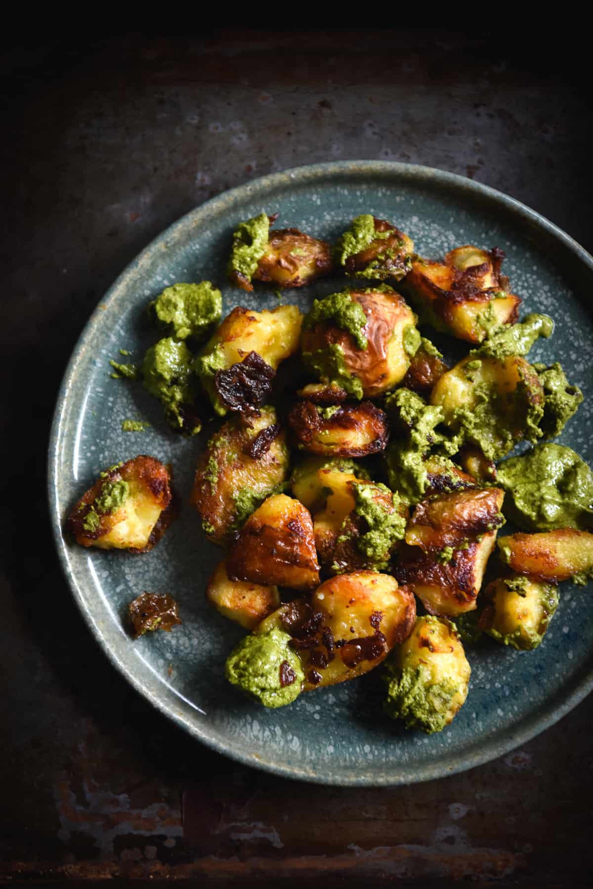 Crispy smashed potatoes in a rocket and almond ‘pesto’ (vegan, FODMAP friendly)