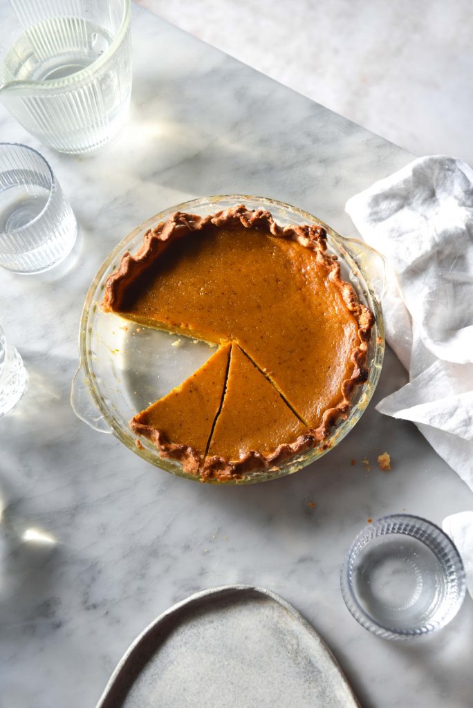 Gluten free pumpkin pie with flaky gluten free pastry and a refined sugar free filling from www.georgeats.com