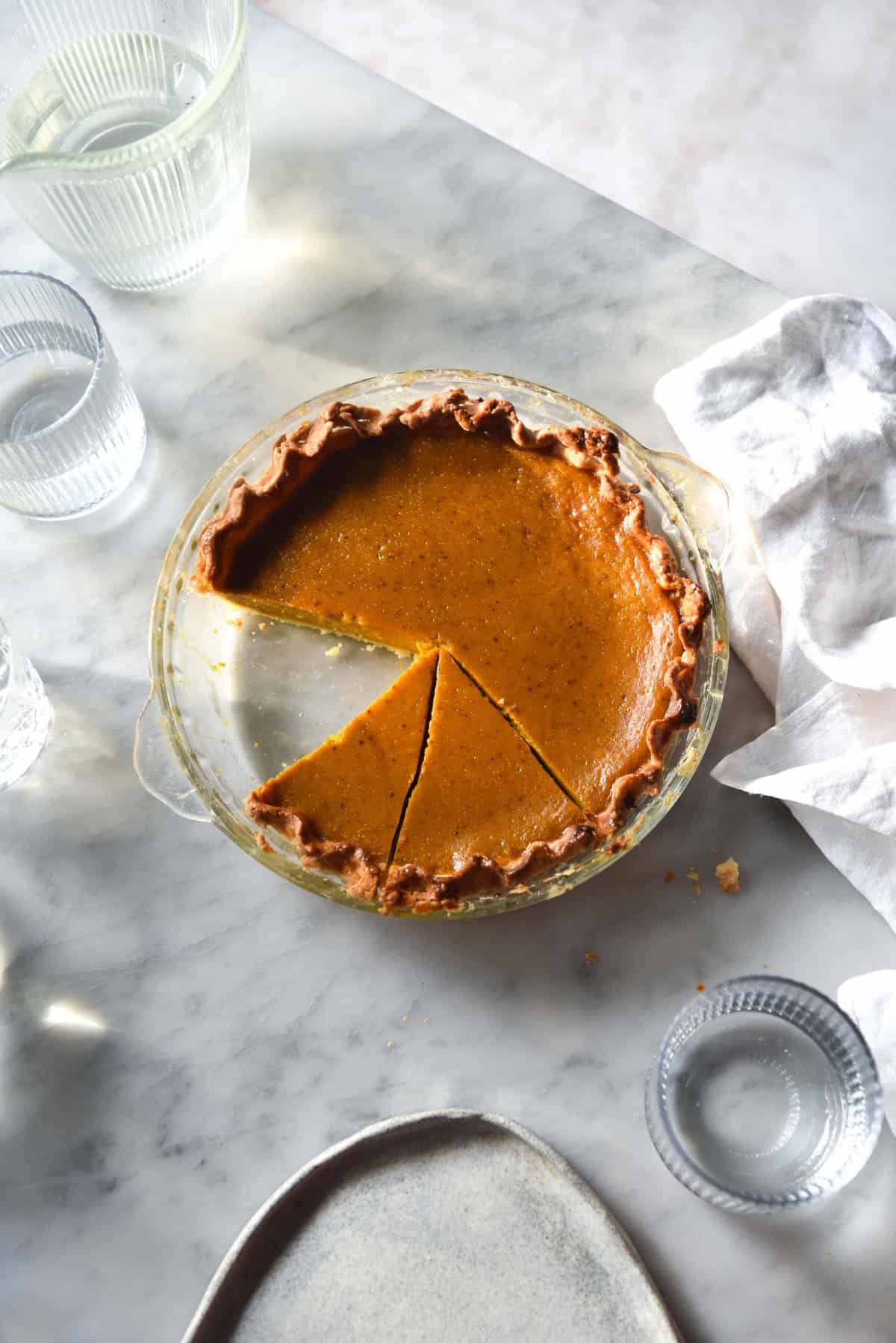 Gluten free pumpkin pie with easy, flaky pastry and a refined sugar free filling (FODMAP friendly)