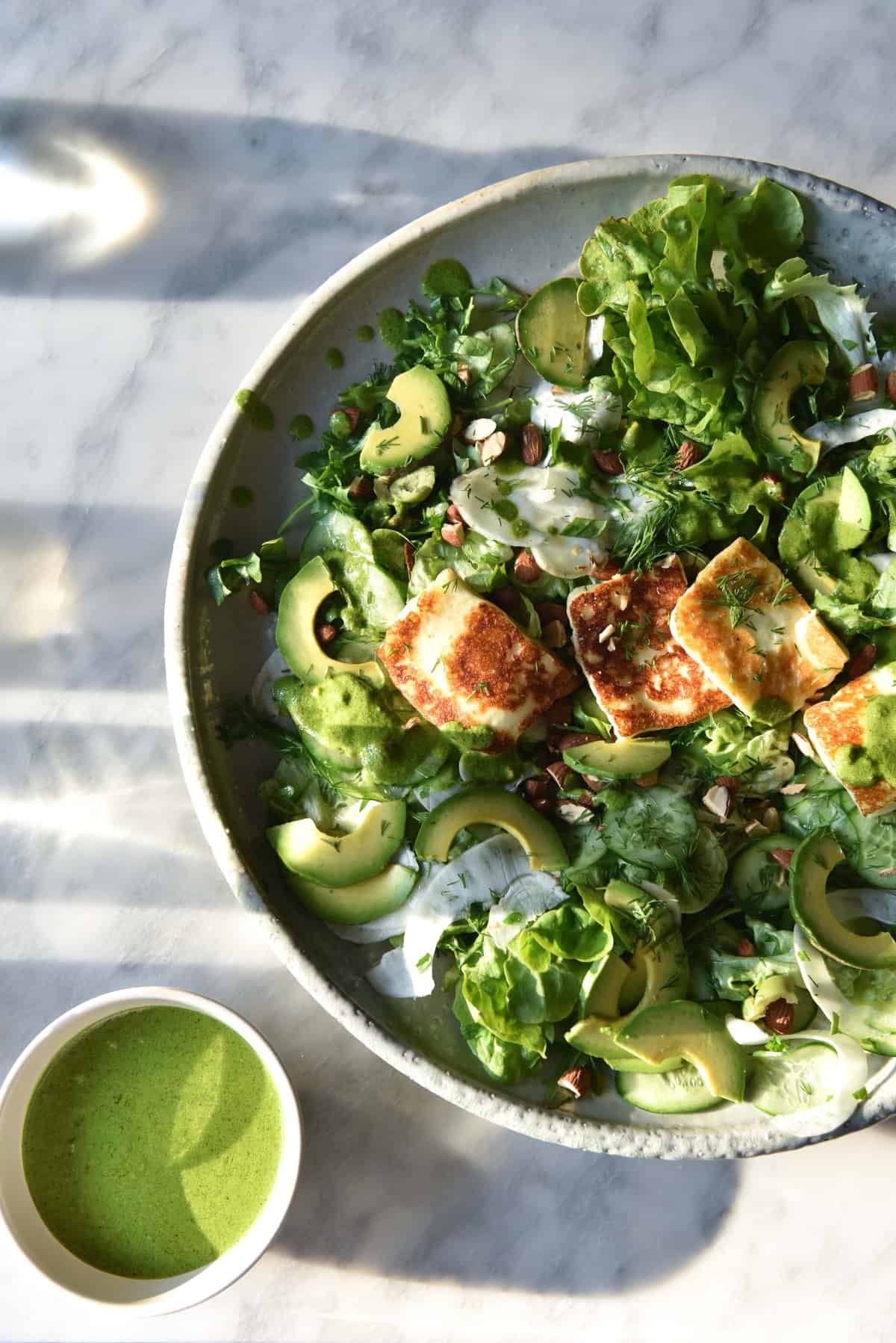 Green haloumi salad with toasted almonds, avo and dairy free pesto from www.georgeats.com | @georgeats