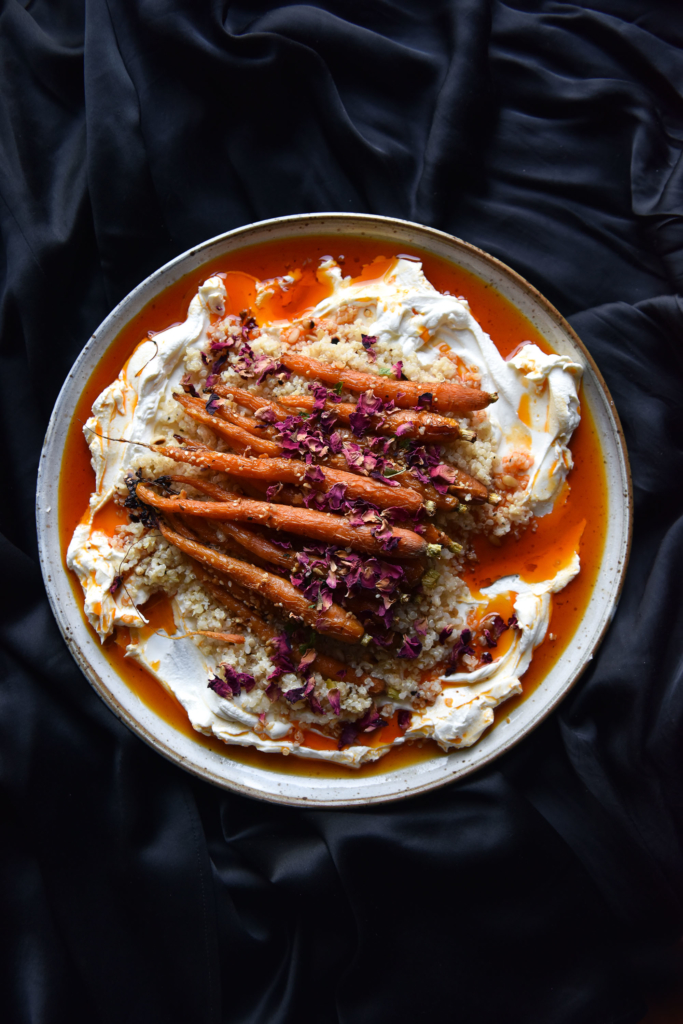 Honey and dukkah roasted carrots with lactose free labne, lemon quinoa and Aleppo chilli oil. FODMAP friendly, gluten free, vegetarian but vegan adaptable. Recipe from www.georgeats.com | @georgeats