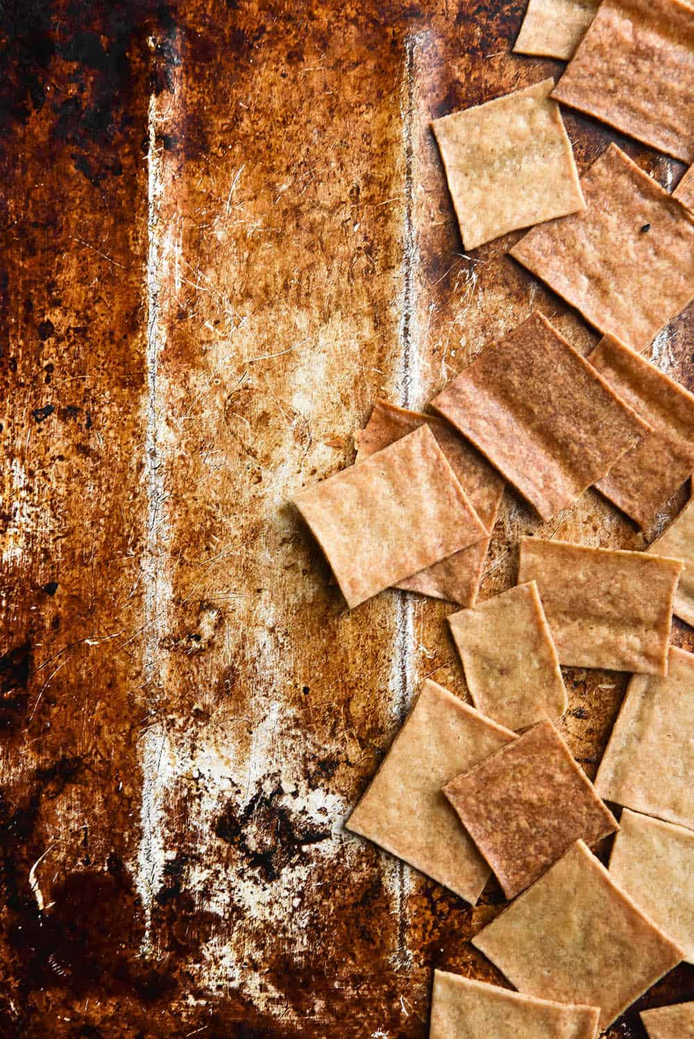 Gluten free sourdough discard crackers with brown butter. FODMAP friendly and nut free - the perfect solution to maintaining a no-waste gluten free sourdough starter. Recipe from www.georgeats.com