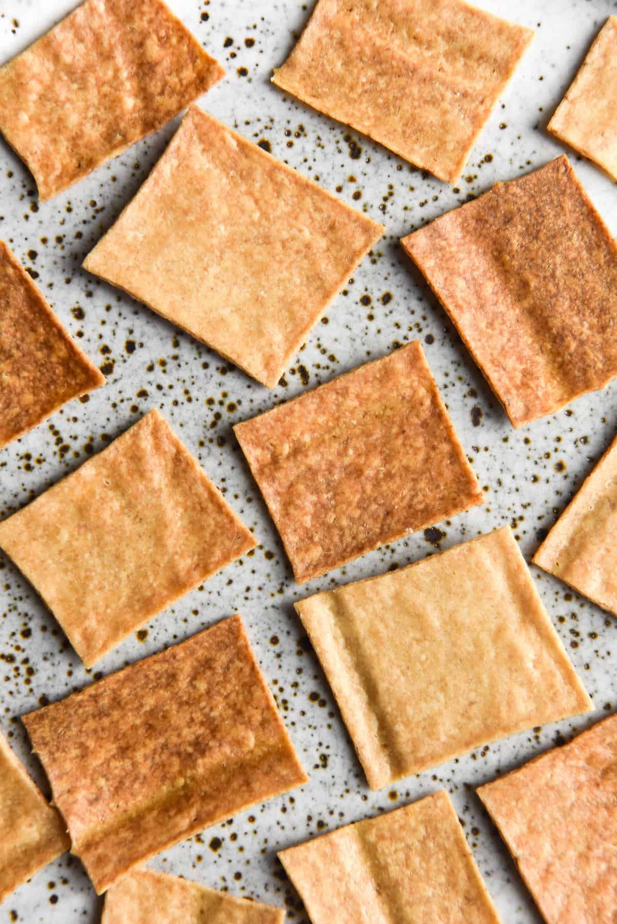 Gluten free sourdough discard crackers with brown butter. FODMAP friendly and nut free - the perfect solution to maintaining a no-waste gluten free sourdough starter. Recipe from www.georgeats.com