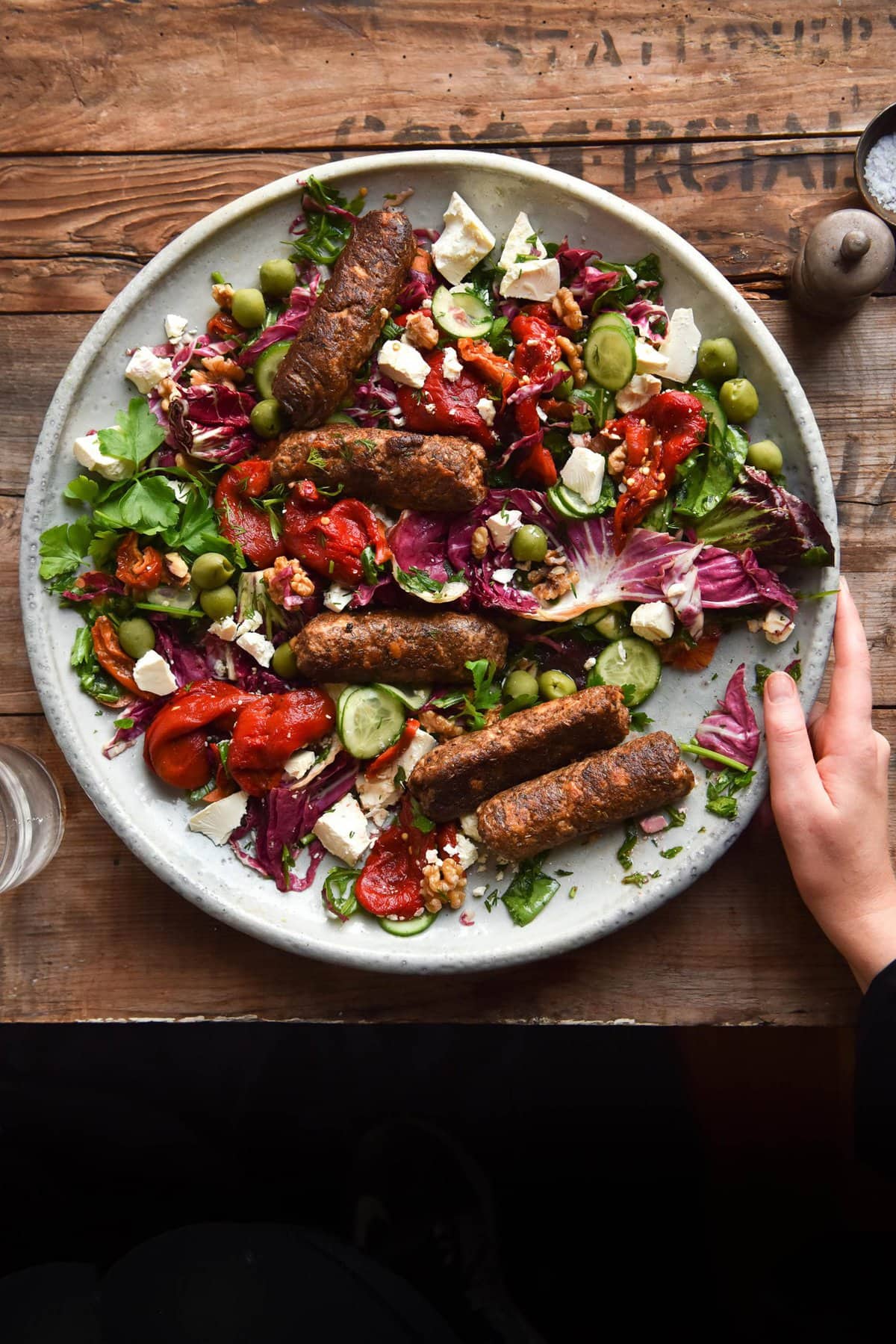 Vegetarian sausage salad that is FODMAP friendly, gluten/grain free and easily adapted to be nut free and/or vegan. Recipe from www.georgeats.com