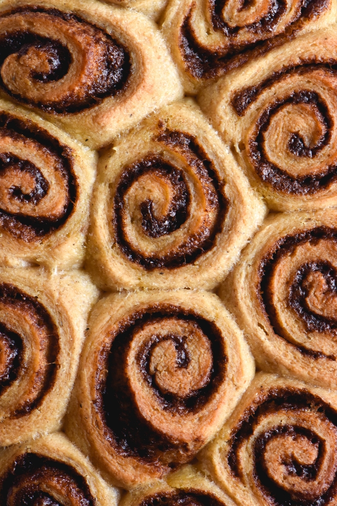 A close up aerial view of a tray of gluten free cinnamon scrolls