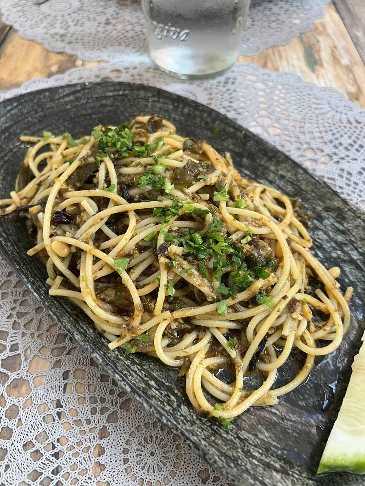 An image of a plate of gluten free vegan pasta con le sarde from MOON restaurant in Ortigia