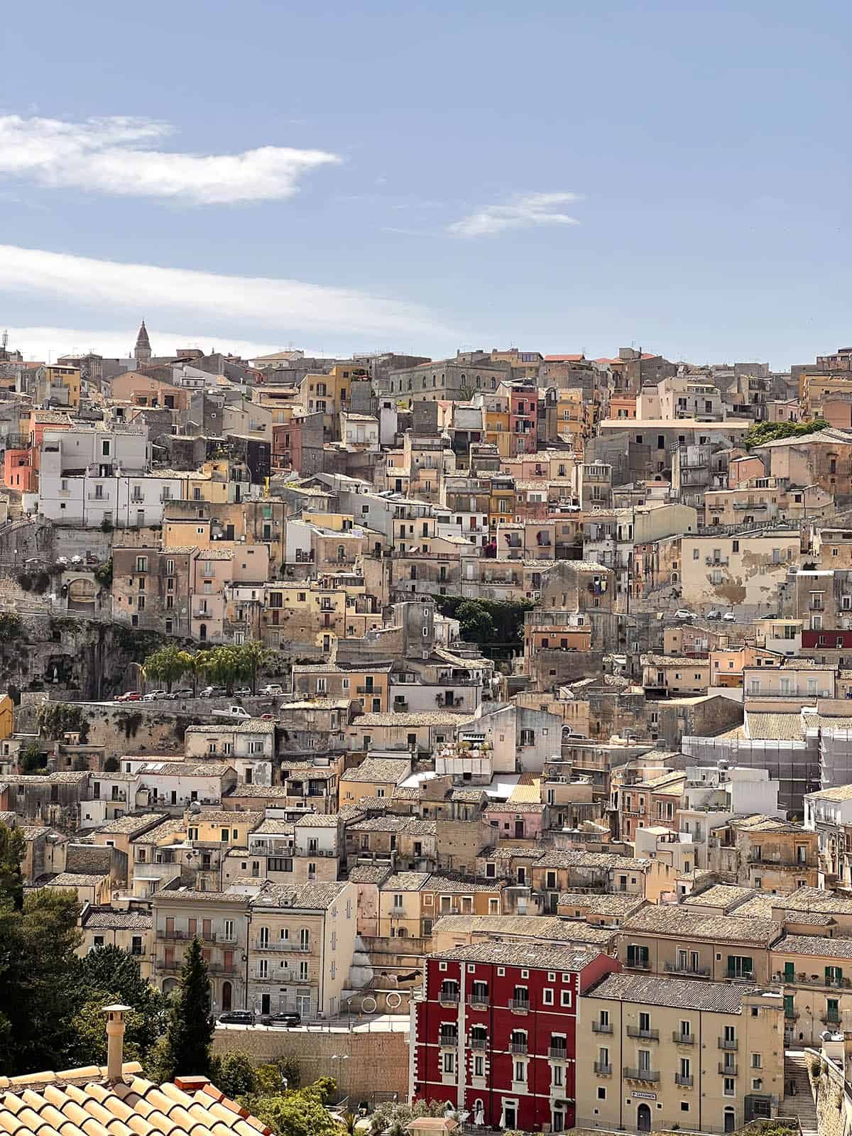 An image of the view of the cliffside houses of Ragusa as viewed from Ragusa Ibla