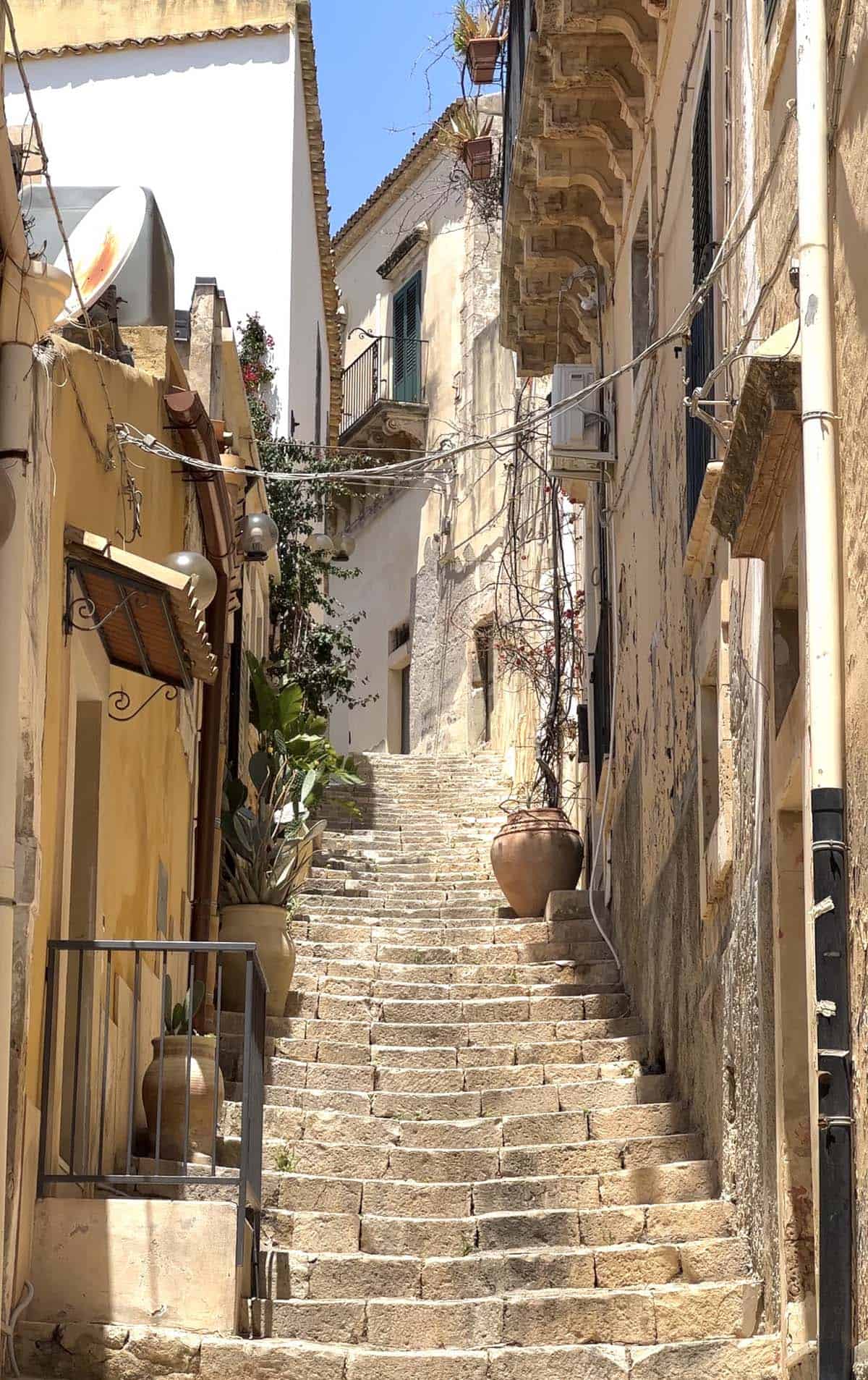An image of a terracotta staircase in Noto, Sicily