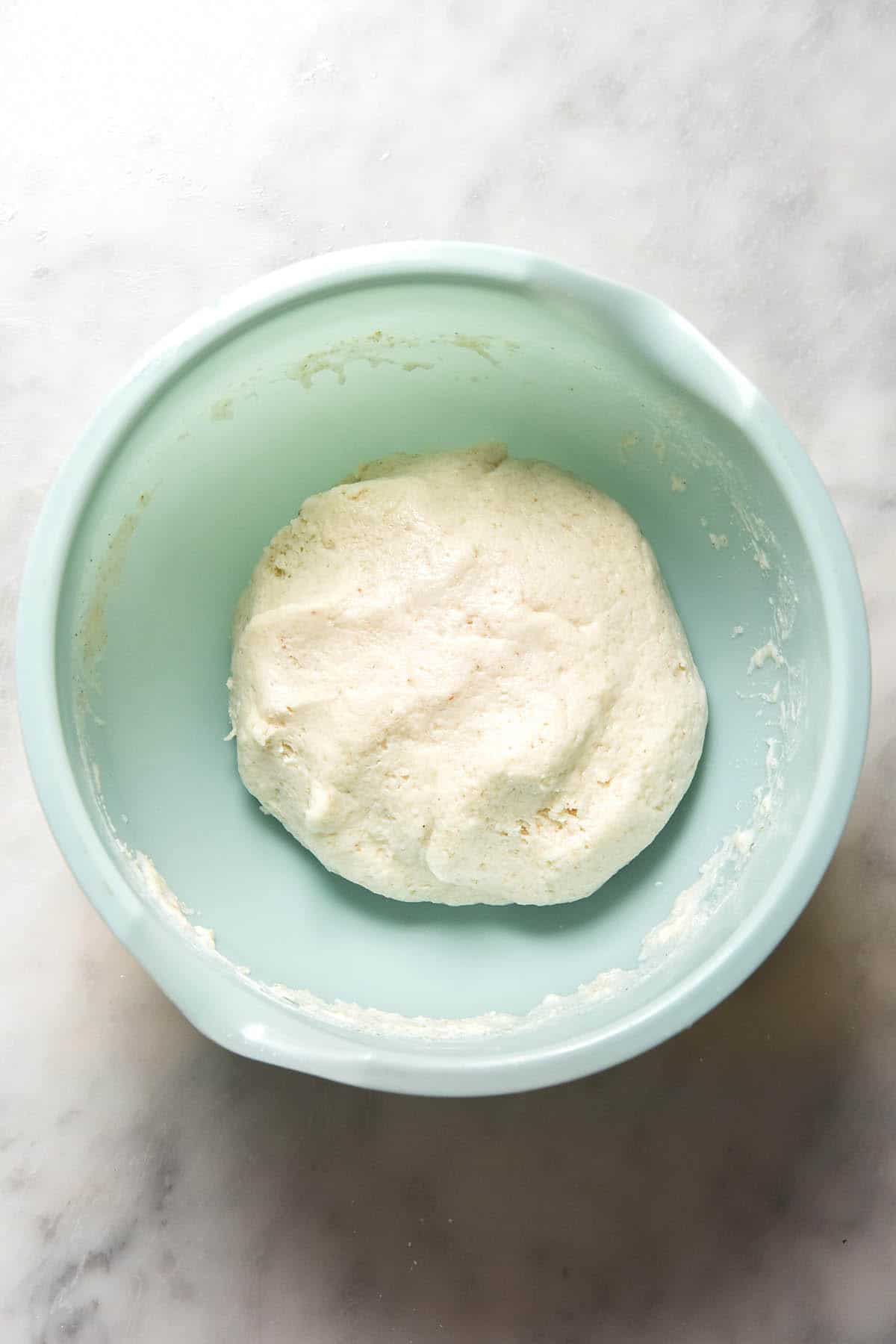 An instructional image of gluten free vegetable bun dough