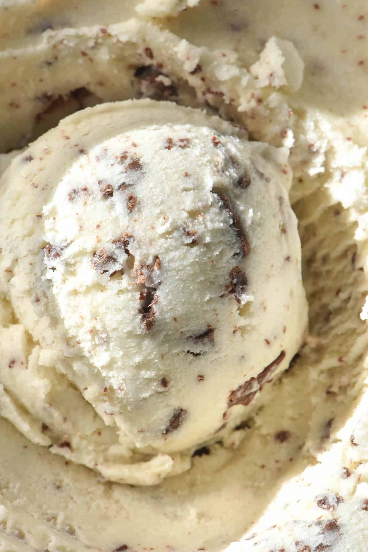 An aerial close up of a scoop of Ninja Creami mint chocolate chip ice cream