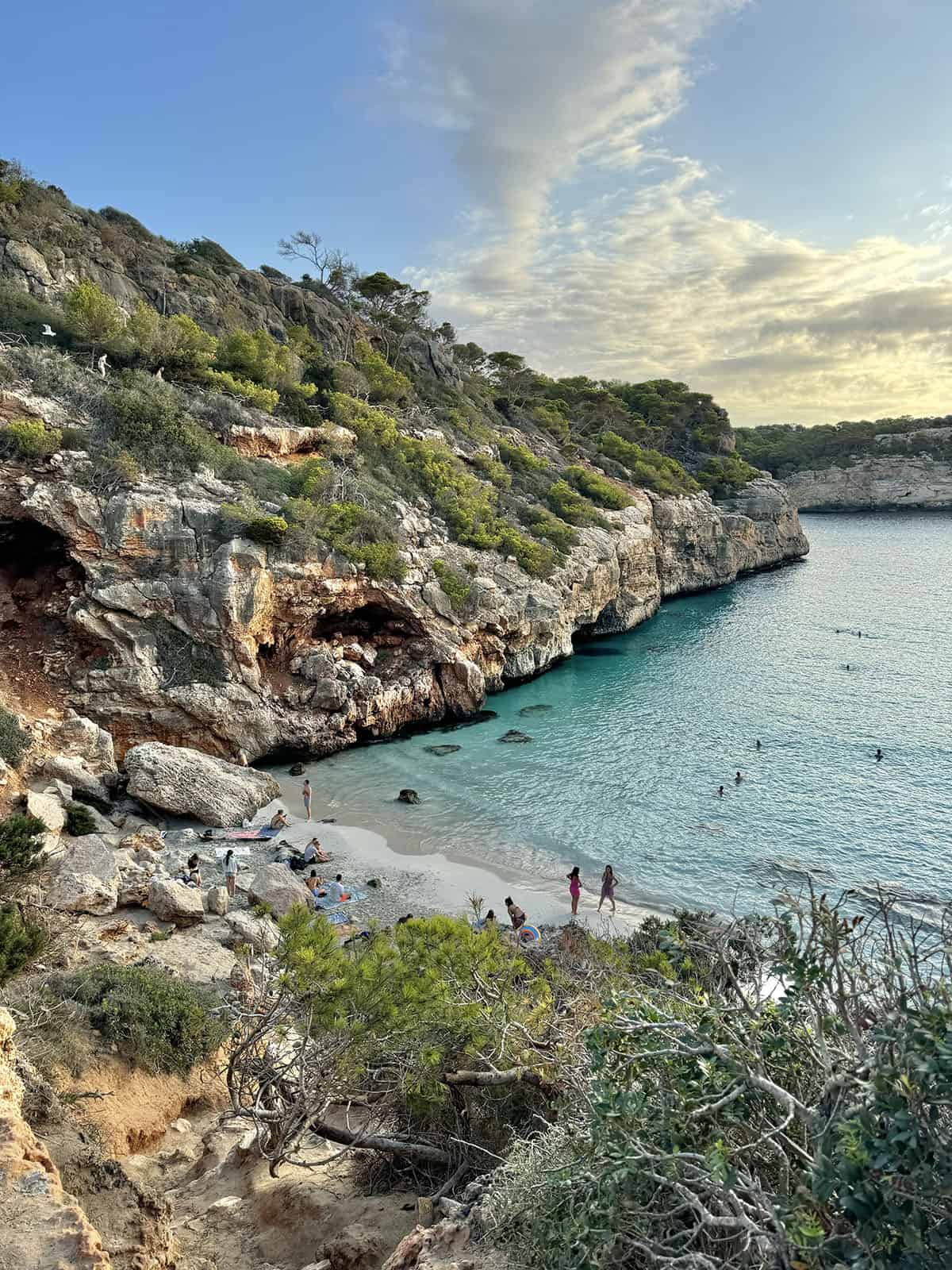 An image of Calo Des Moro captured from the top of the cliff leading down to the beach