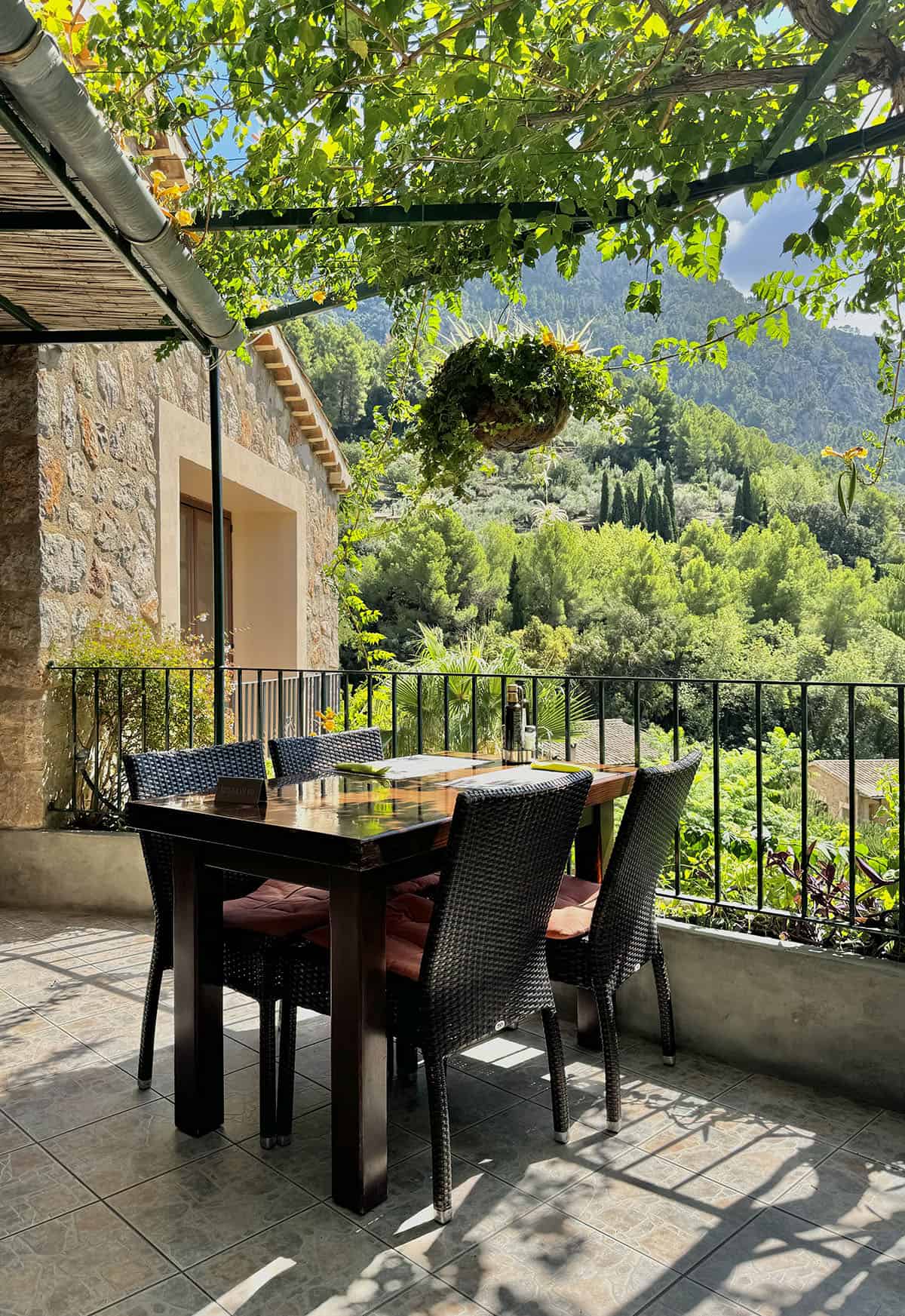 An image of a table on the terrace at El Turo restaurant in Fornalutx, Mallorca