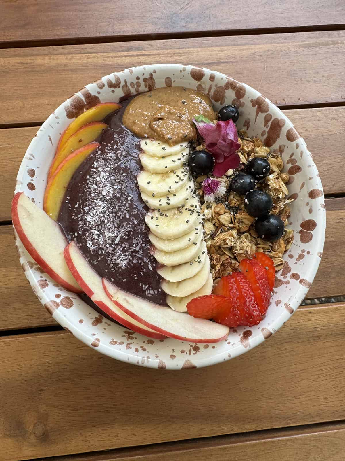 An açai bowl topped with granola, fruit and nut butter from Bo's Pollenca in Mallorca