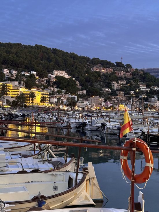 An image of the boats in Port De Soller at sunset