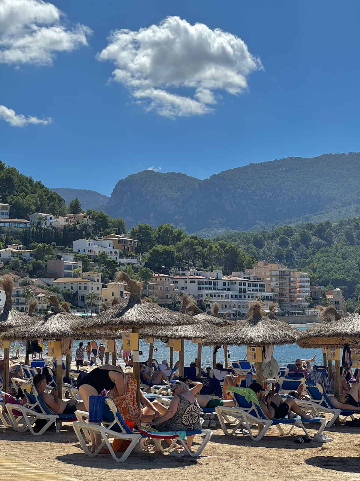 An image of the beach at Port De Soller, Mallorca on a sunny summer day