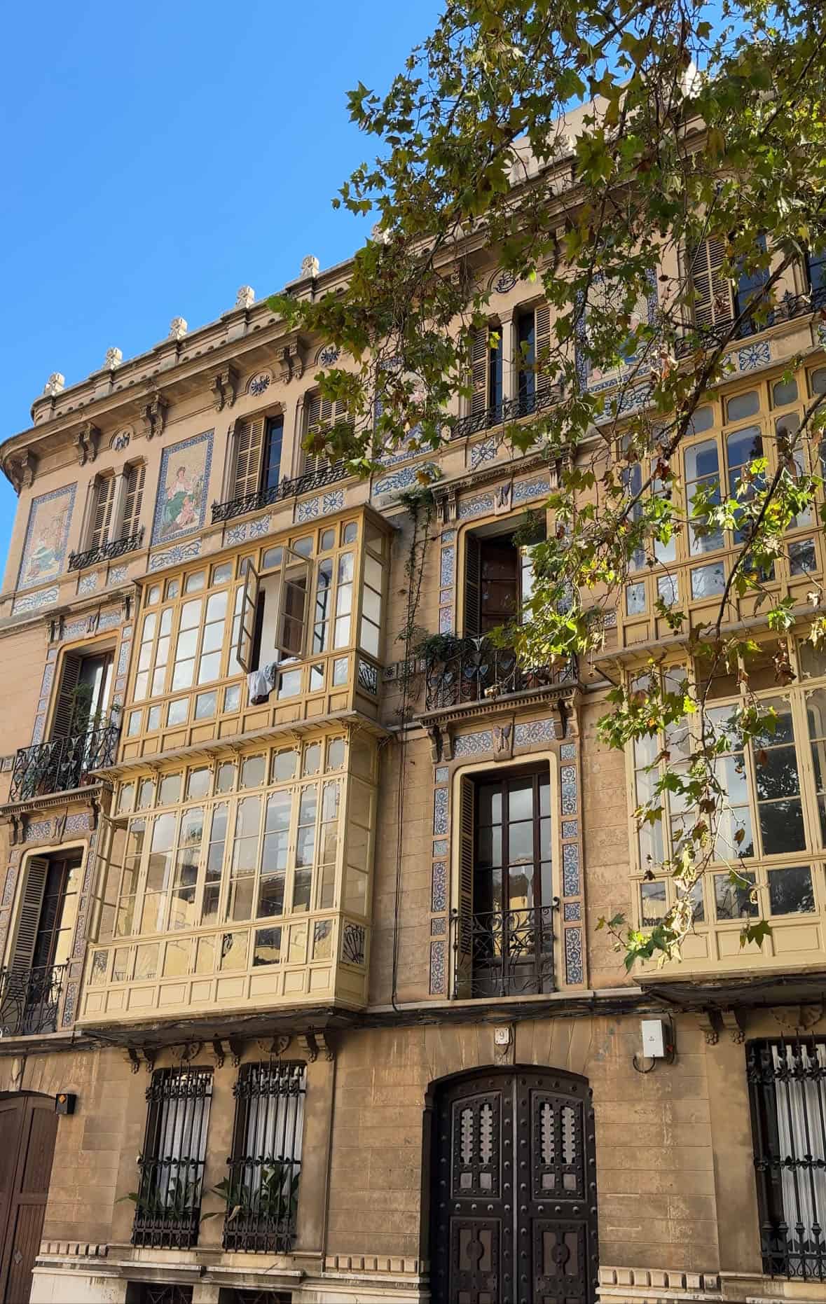 A beautiful building in old town Palma set against a bright blue sky