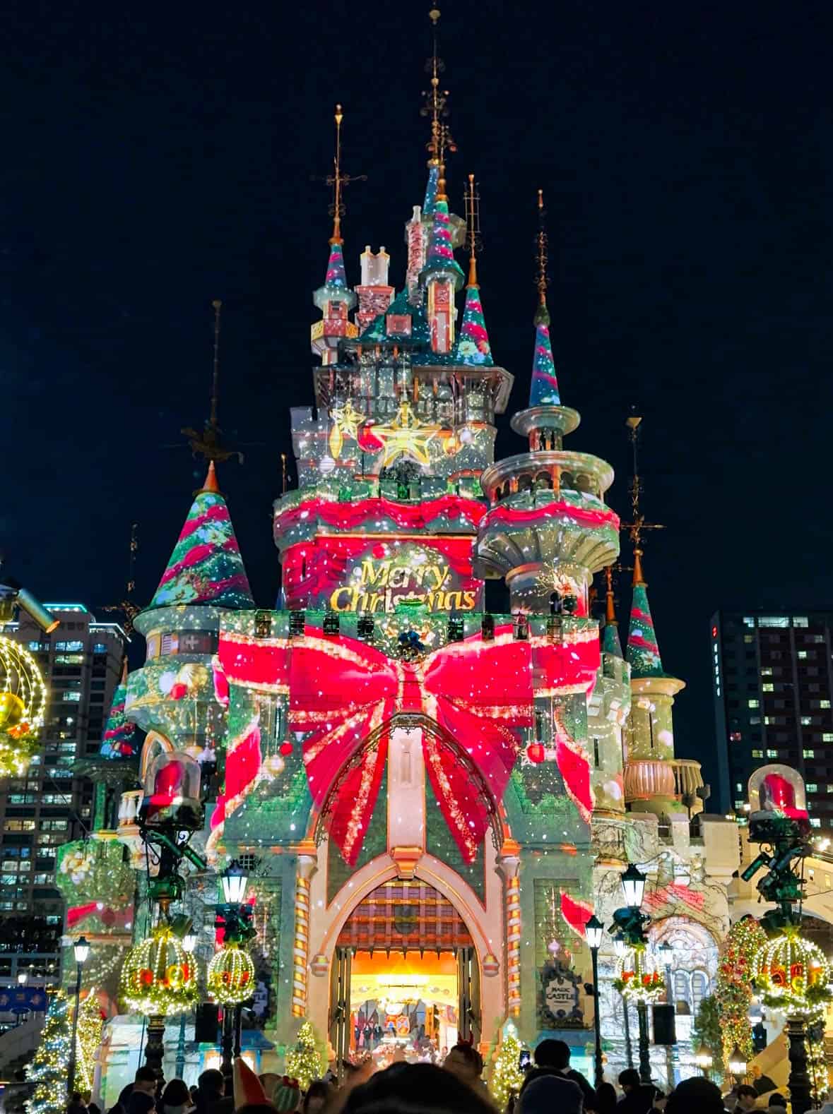 Lotte world castle decorated with Christmas colours at night