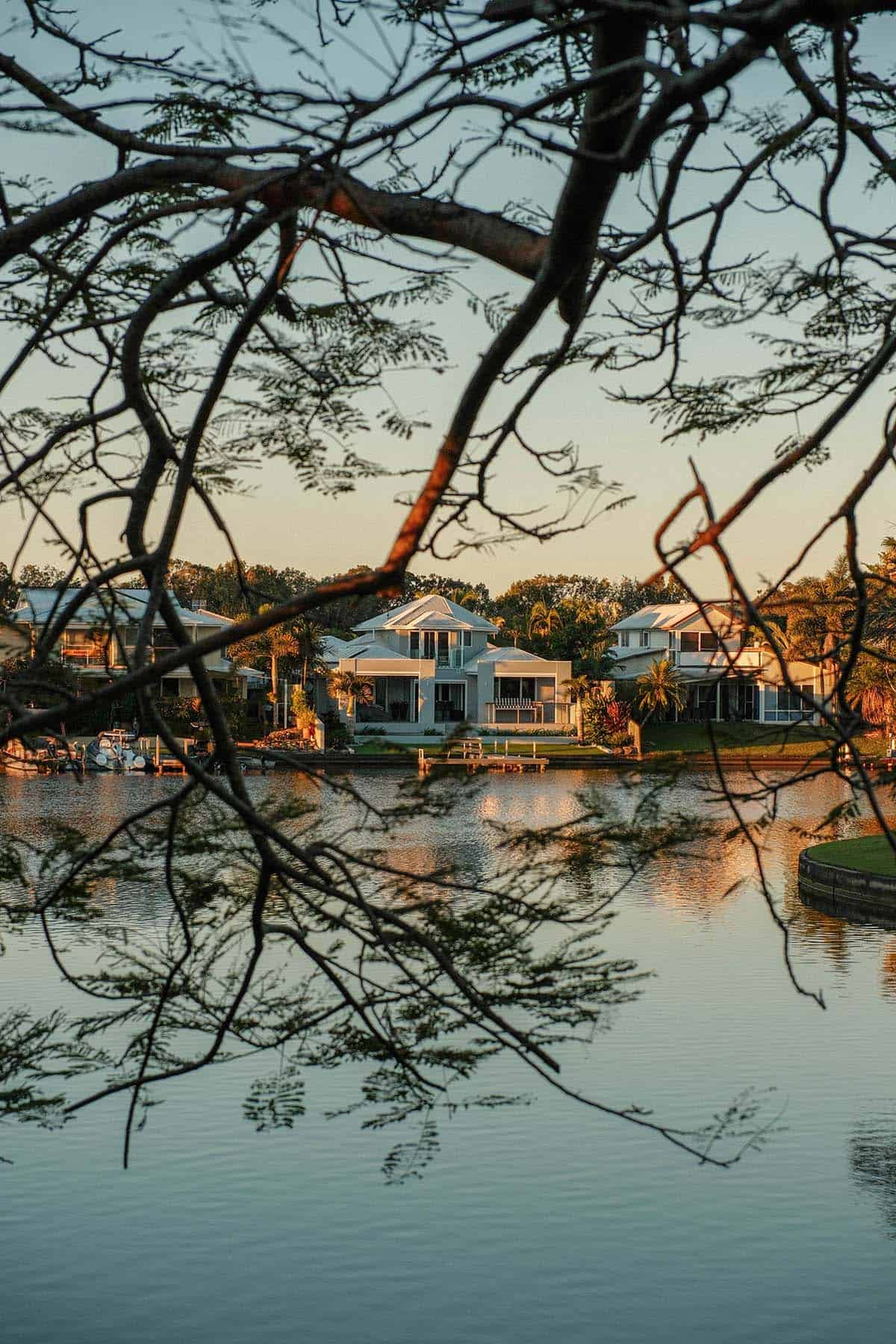 A photo of the river and houses in Noosa, Queensland, at sunset
