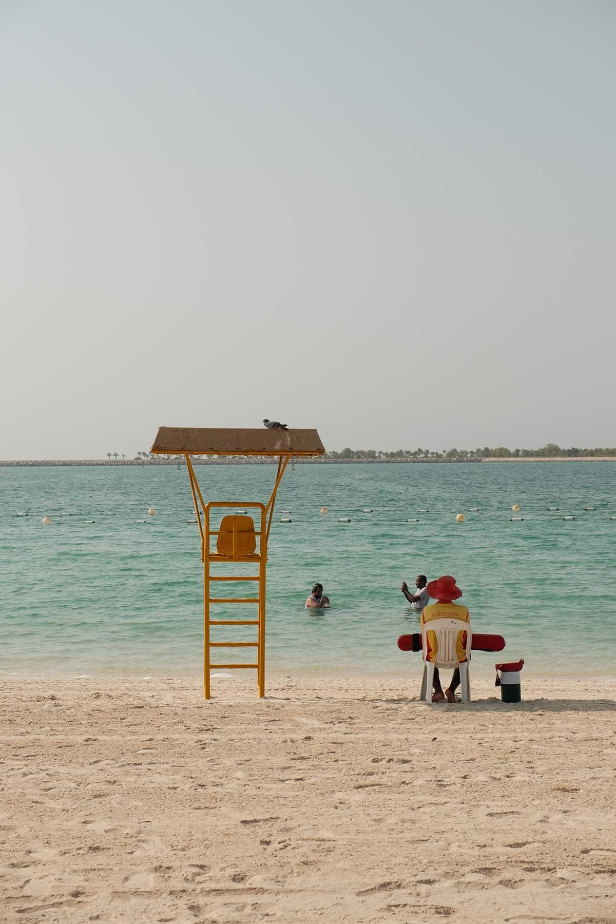 An image of a lifeguard on duty at Corniche Beach in Abu Dhabi