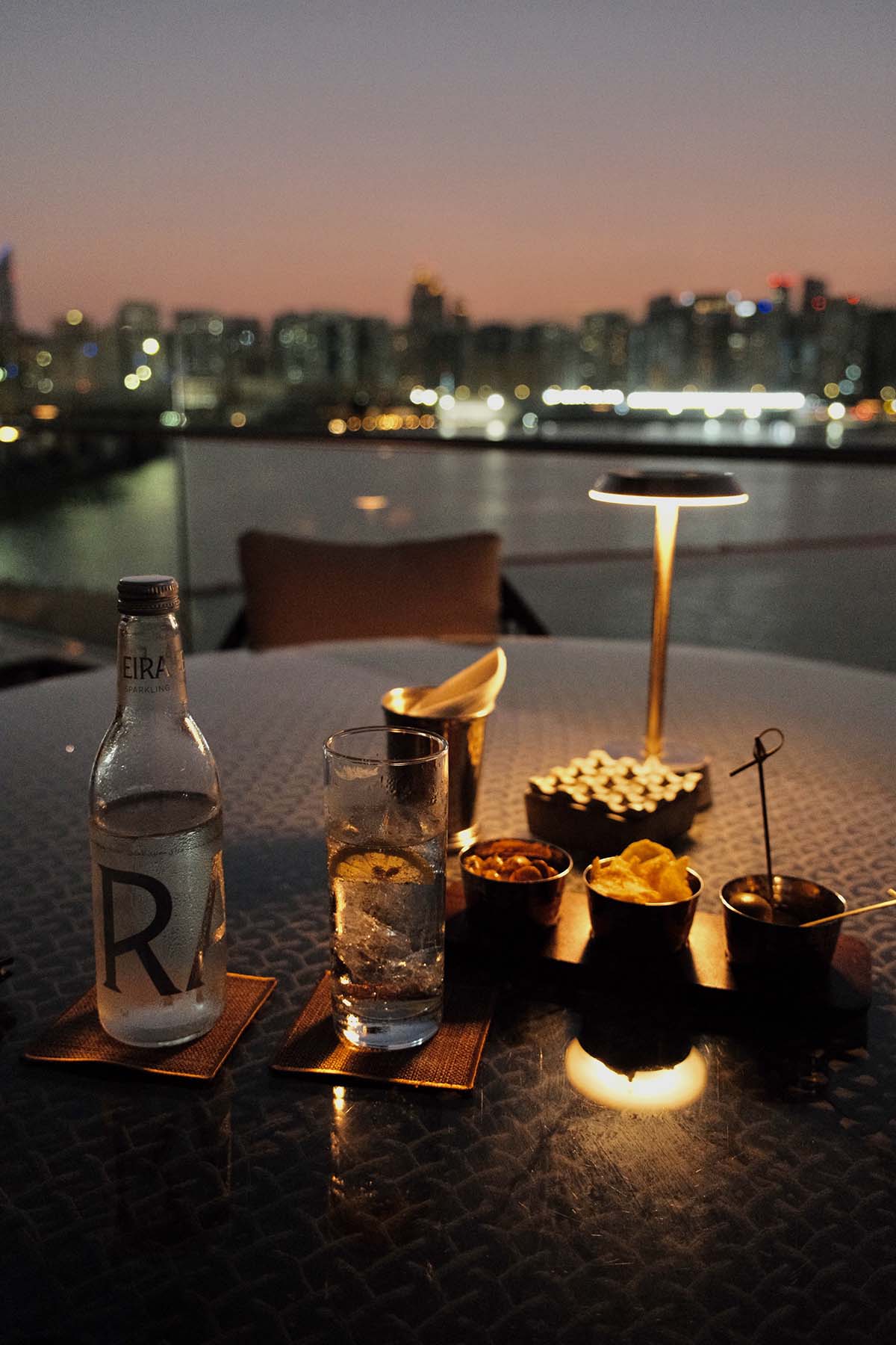 An image of sunset cocktails at Hidden Bar in The Rosewood, Abu Dhabi