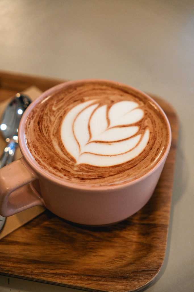 An image of a cappuccino topped with latte art at Fjåk in Bergen, Norway