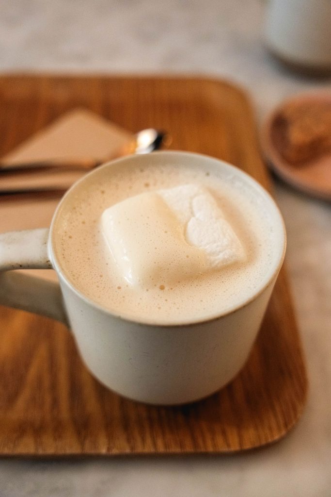 An image of a white chocolate and brown cheese hot chocolate from Fjåk in Bergen, Norway