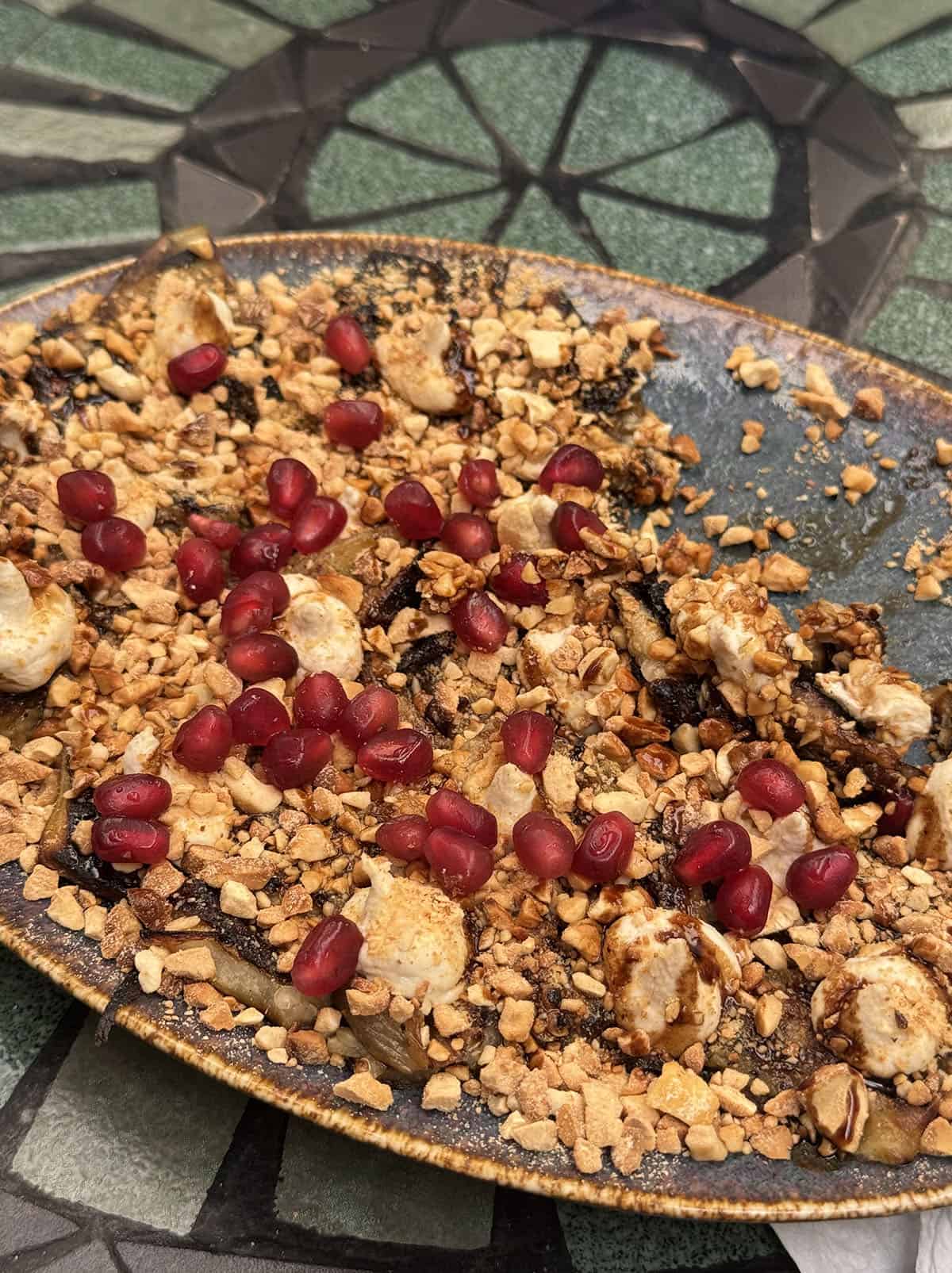 An image of an eggplant and pomegranate dish at Bamba in Nairobi