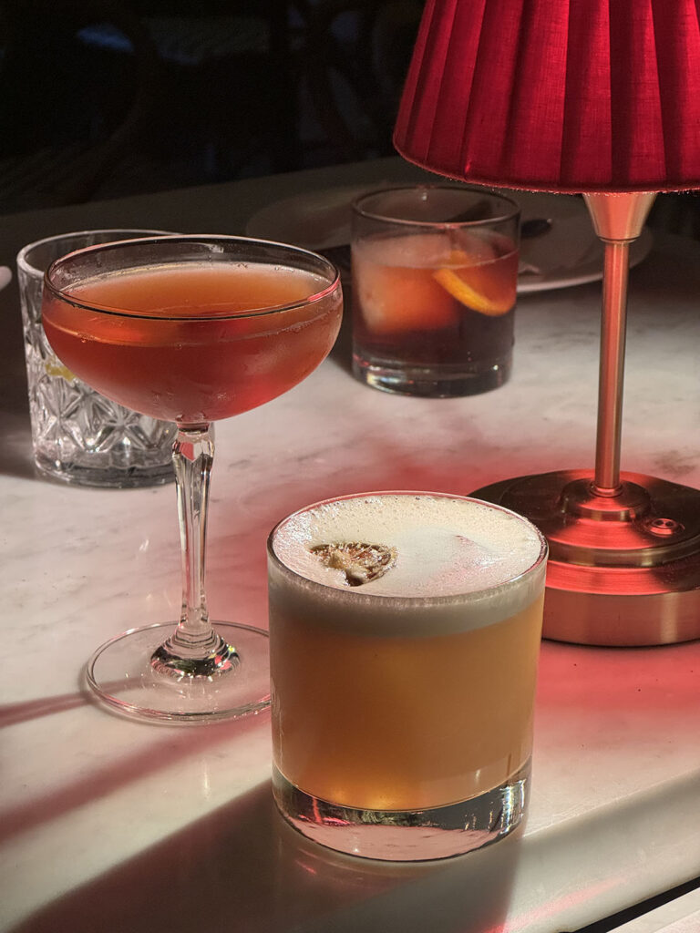 An image of cocktails in moody lighting at Beit E Selam in Nairobi, Kenya
