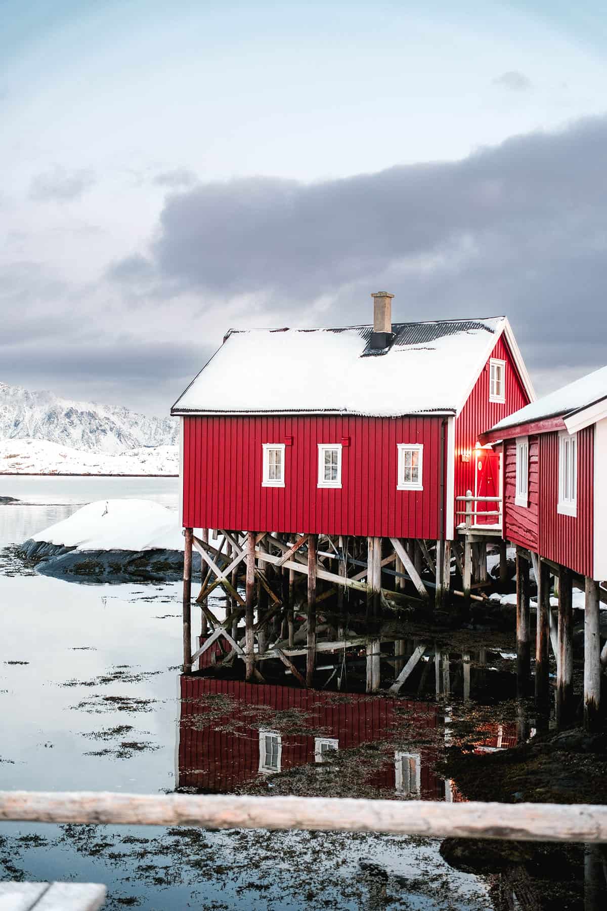 An image of a over water rorbu in Svinøya, Svolvær Norway in winter